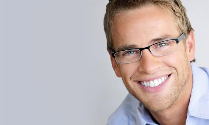 Man smiling on Dental Crowns page